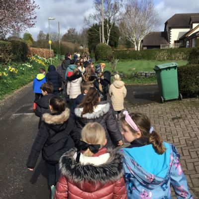 Children walking to the woods
