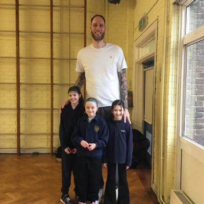 Basketball player with three children