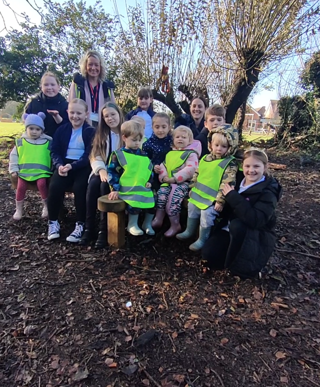 Group of children on a log