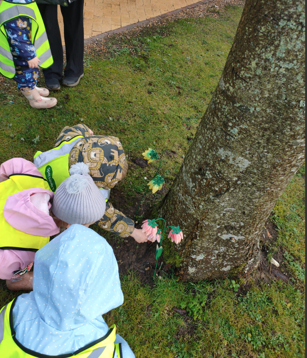 Children by a tree