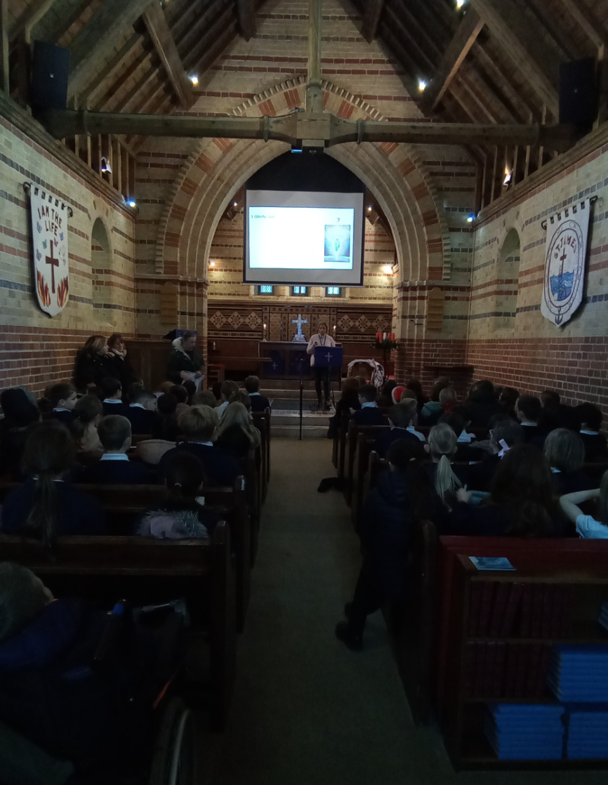 Children in church listening to a sermon