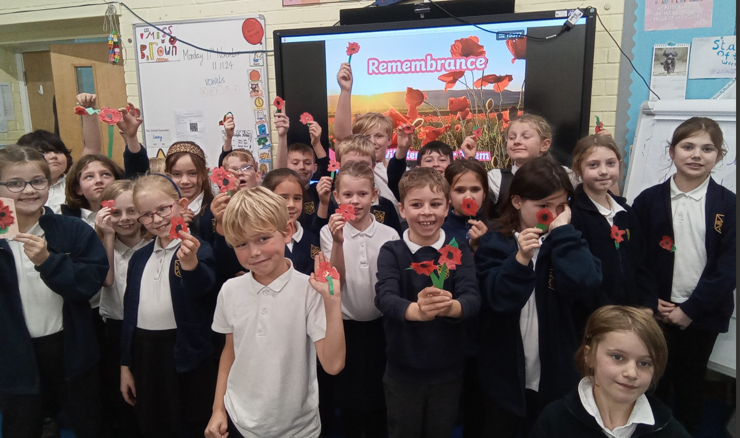 Children holding poppies