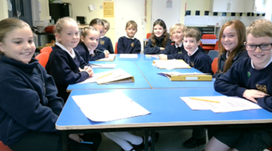 Children sat around a table.