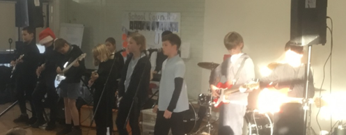 Children singing in a band