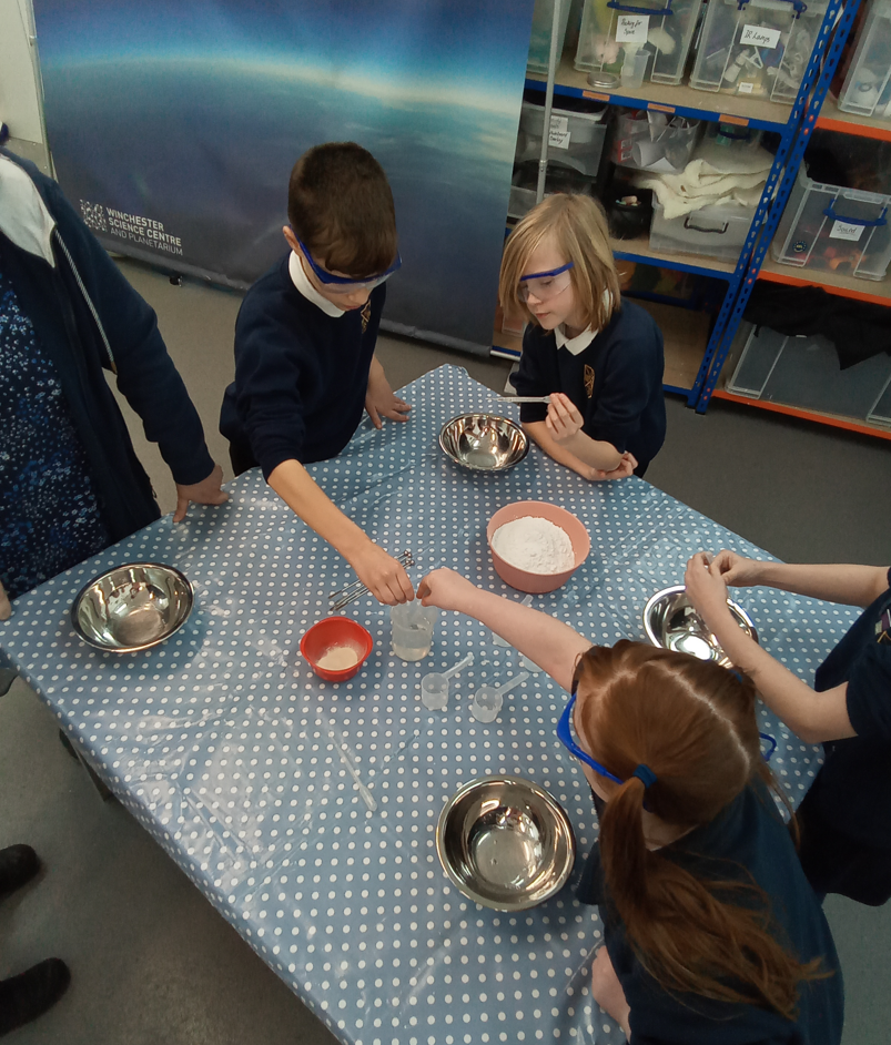 Group of children taking part in experiments