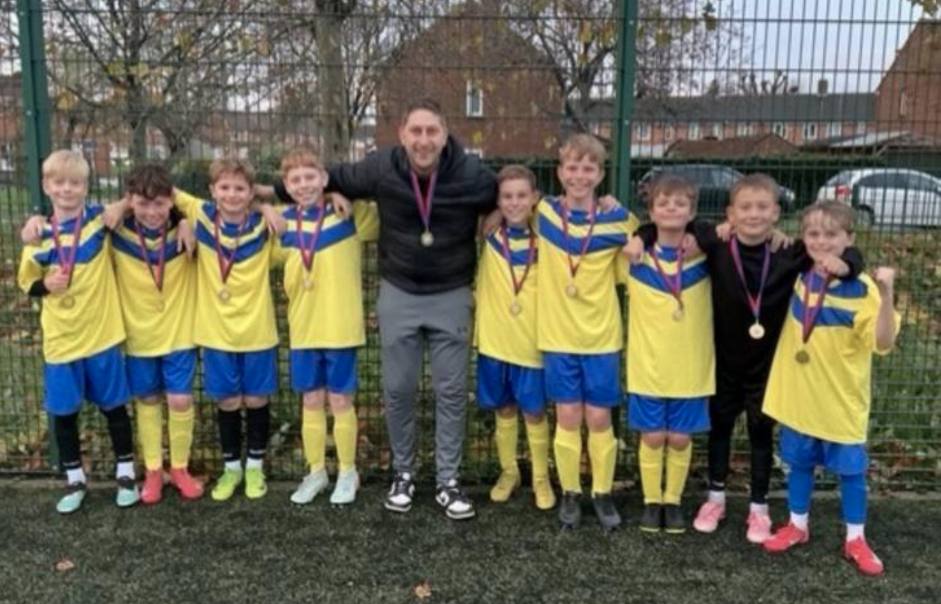 football players and teacher