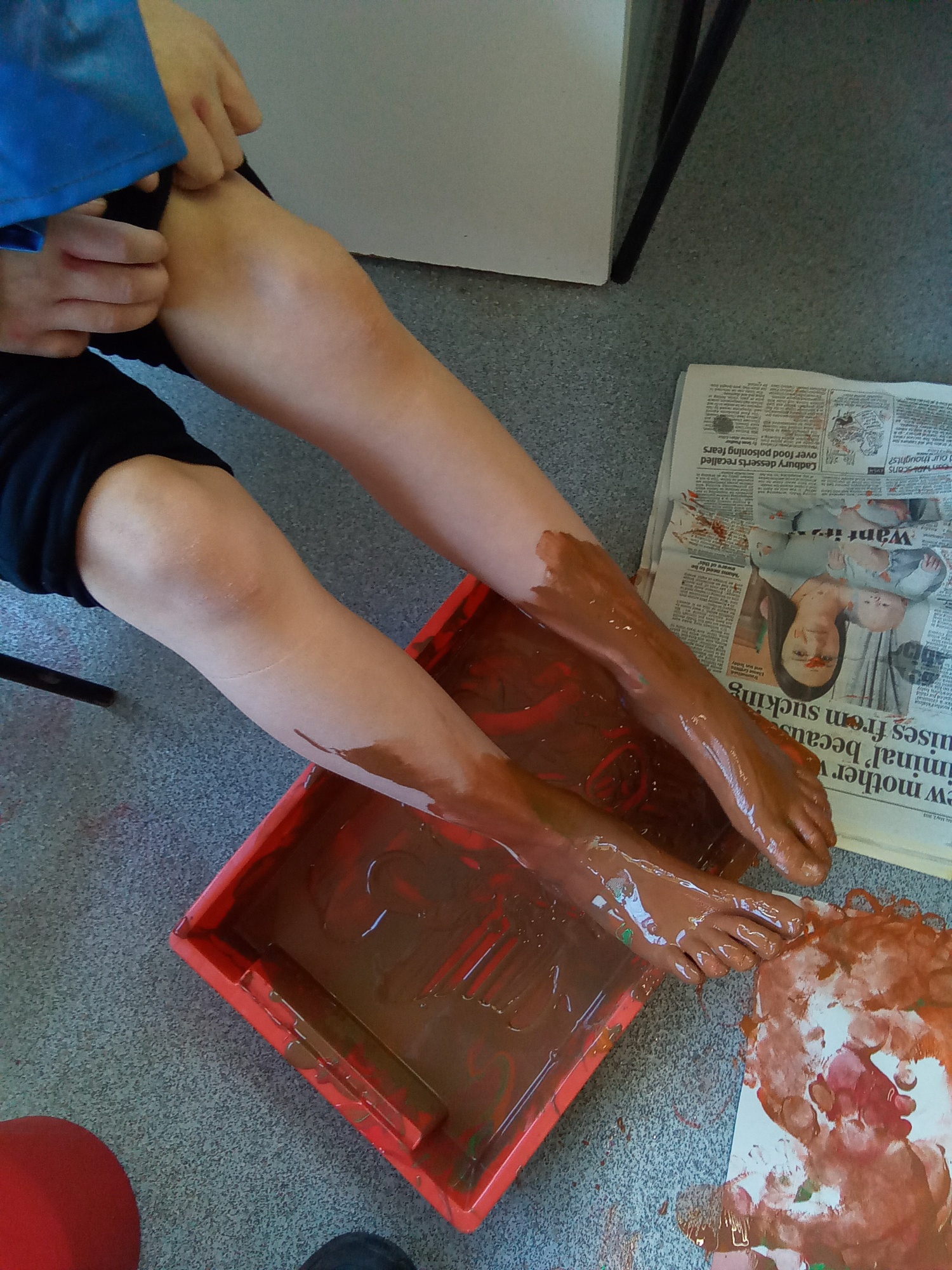 Child's feet painted to do printing