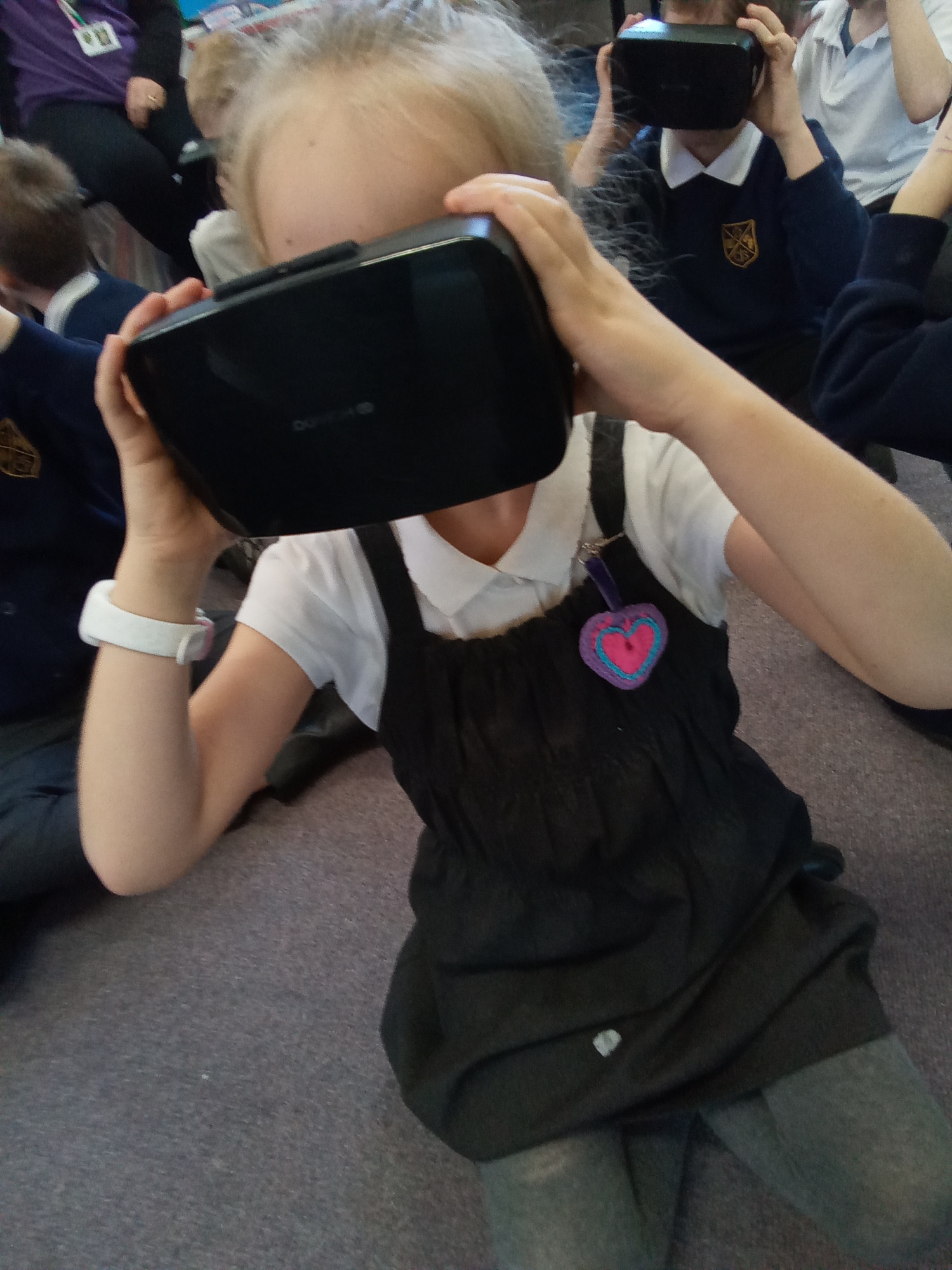 Child using VR headset for history