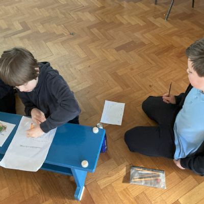 Children drawing seahorse habitat