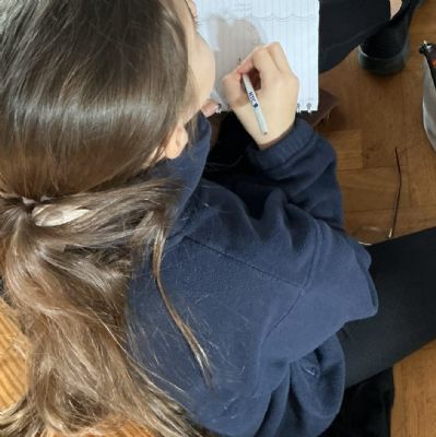 Child drawing seahorse habitat
