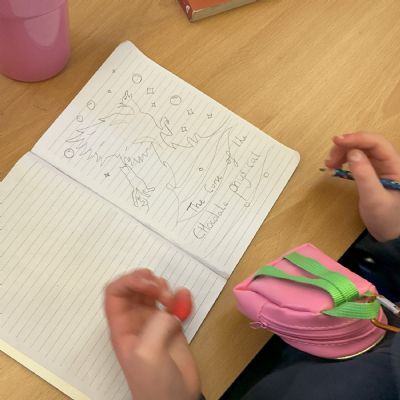 Children working on their reading scrapbook
