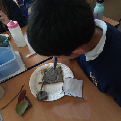 Child working with clay